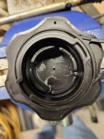 Cas cap Briggs with drilled vent hole.jpg