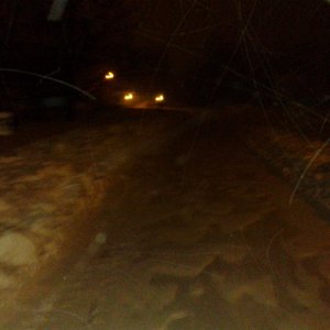 This is around 3 am when they plowed my road with a front end loader. There was around a foot of snow on the road before they plowed and they only mad