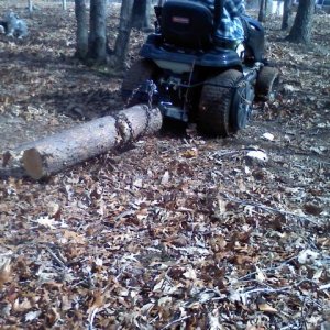 Dragging the Logs out (12). Short logs, pulled tight to the hitch before flipping the sleeve hitch will completely lift off the ground.