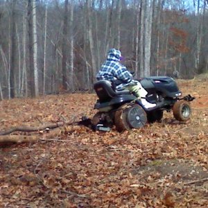 Dragging the Logs out (11)Going through a hole lifted the front wheel.