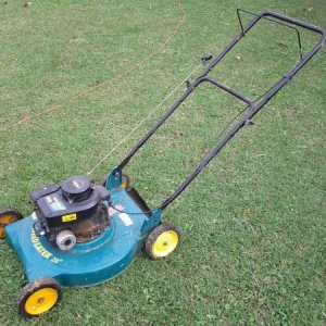 2008 Weed Eater 20" with Briggs & Stratton 300 Series engine. (Also before cleanup!) Came with the Snapper.