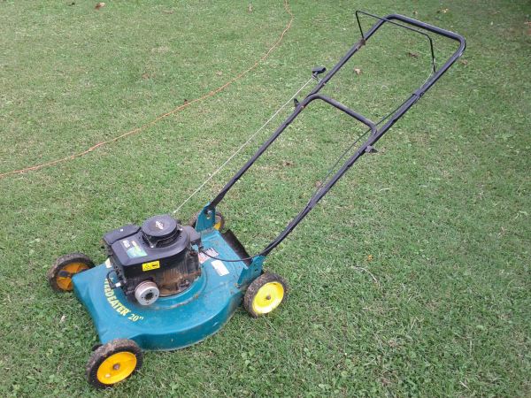 2008 Weed Eater 20" with Briggs & Stratton 300 Series engine. (Also before cleanup!) Came with the Snapper.