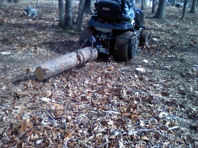 Dragging the Logs out (12). Short logs, pulled tight to the hitch before flipping the sleeve hitch will completely lift off the ground.