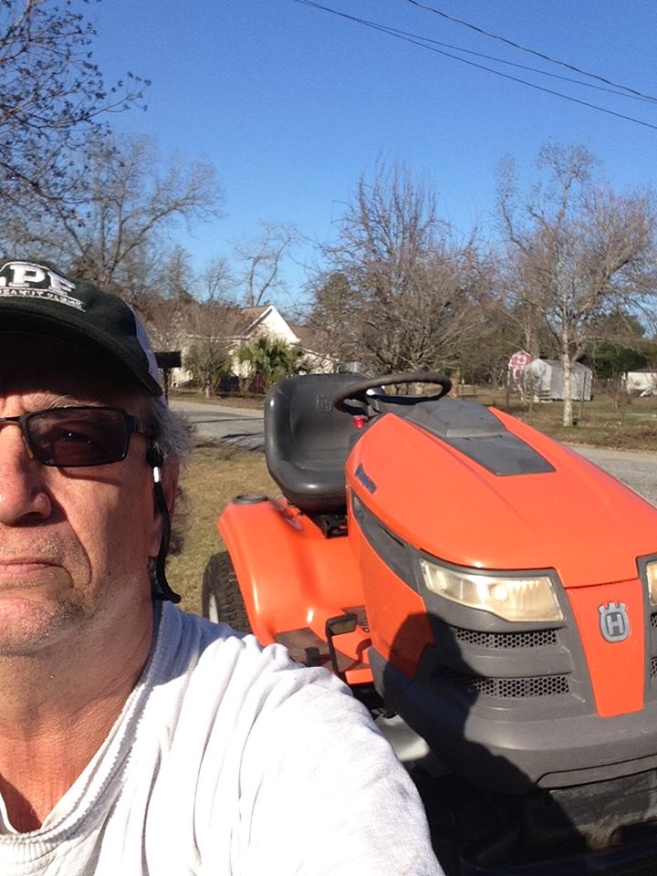 I don't think I have ever done a lawnmower selfie before! In front of my "fixer upper" YTH2348.