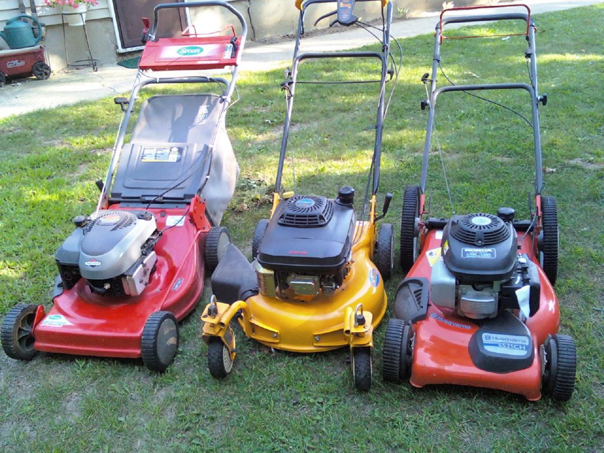 Nice set of machines. That's the Husqvarna that had the broken wheel bracket on the right. The Scotts machine on the left had a real cool primer butto