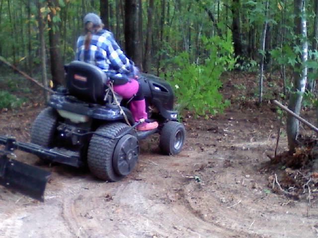 Plowed a Tree Down. She hit the same tree later and I caught it as she ran it over.