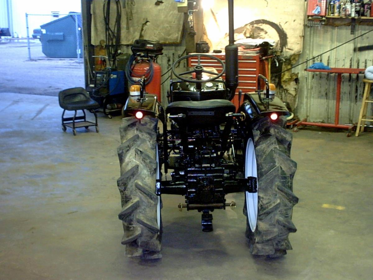 Years ago I took 3 junked tractors and reassembled them into 1 that ran perfect, then I gave it a paint job w/new decals.